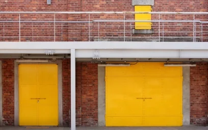 yellow shutters outside a commercial building
