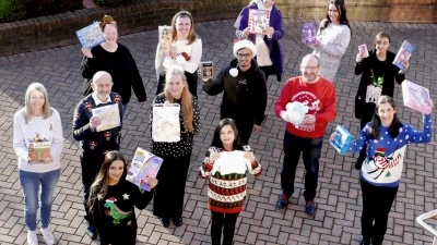 Festive Christmas jumpers ready to deliver our gifts for Cash For Kids Mission Christmas