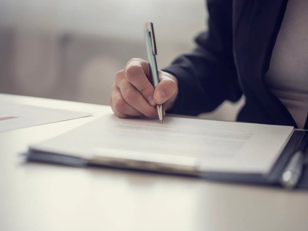 Signing a non-disclosure or confidentiality agreement Signing a non-disclosure or confidentiality agreement