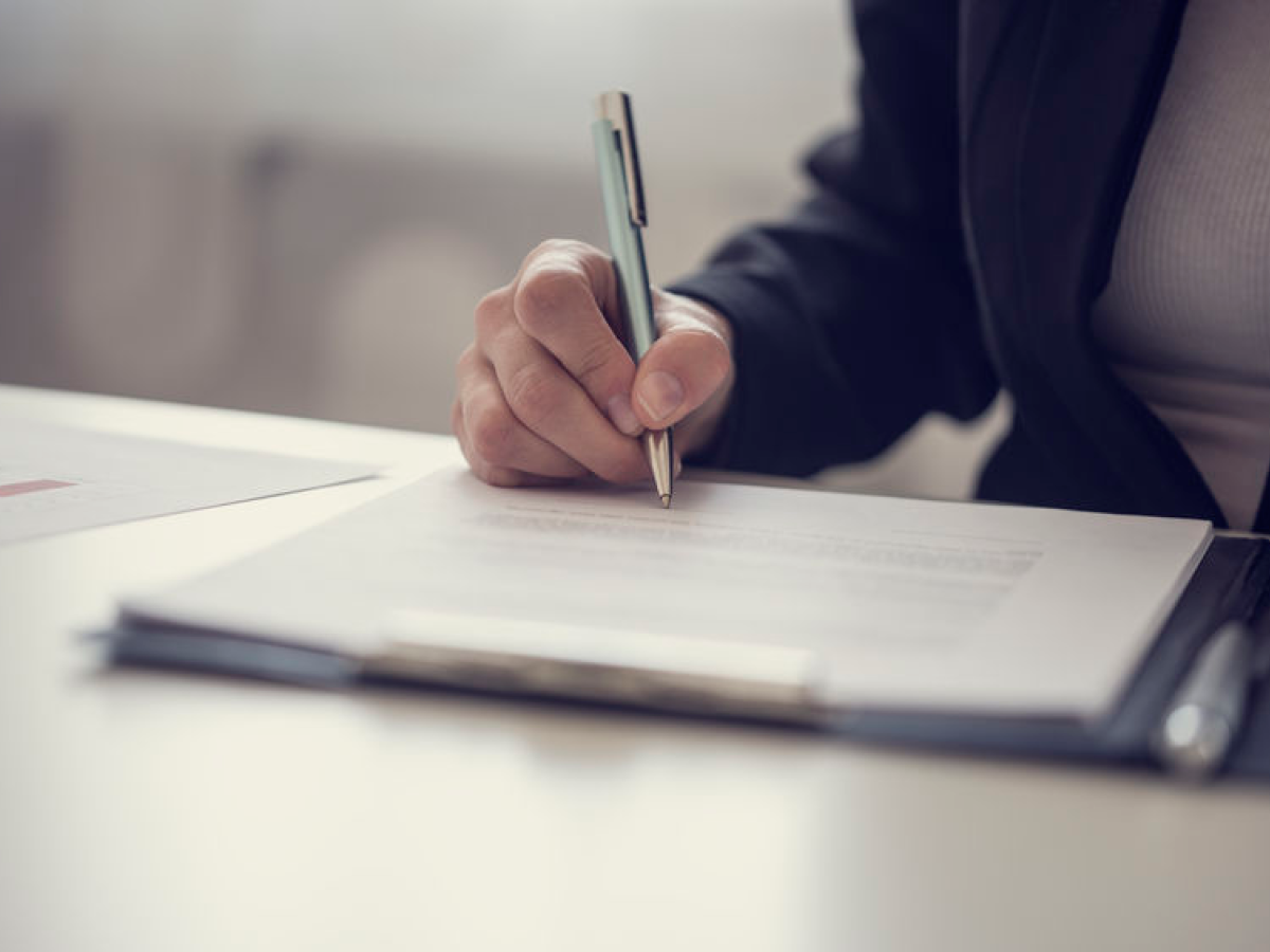 Signing a non-disclosure or confidentiality agreement Signing a non-disclosure or confidentiality agreement