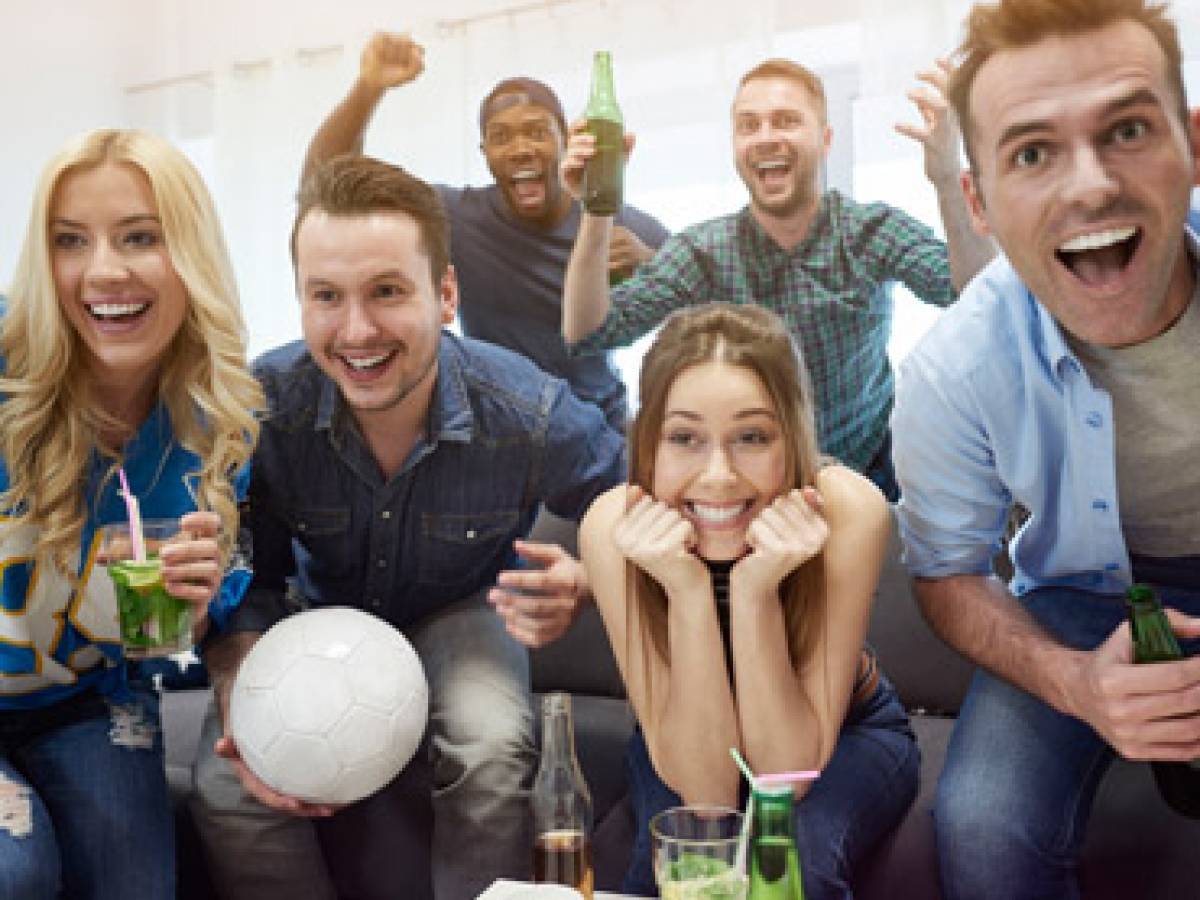 Employees watching football Employees watching football