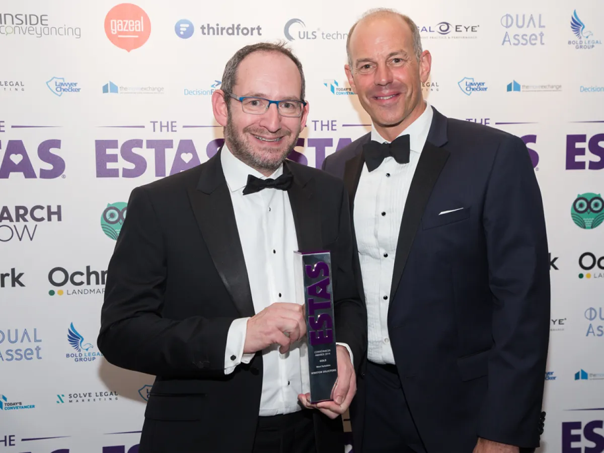 Jonathan Winston is presented with an ESTAS award by Phil Spencer