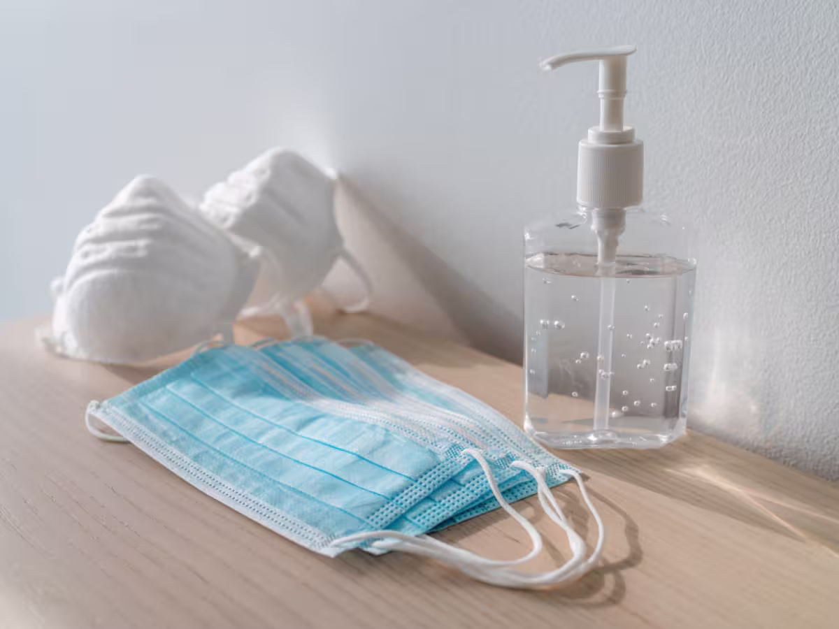 covid safe face mask and hand gel