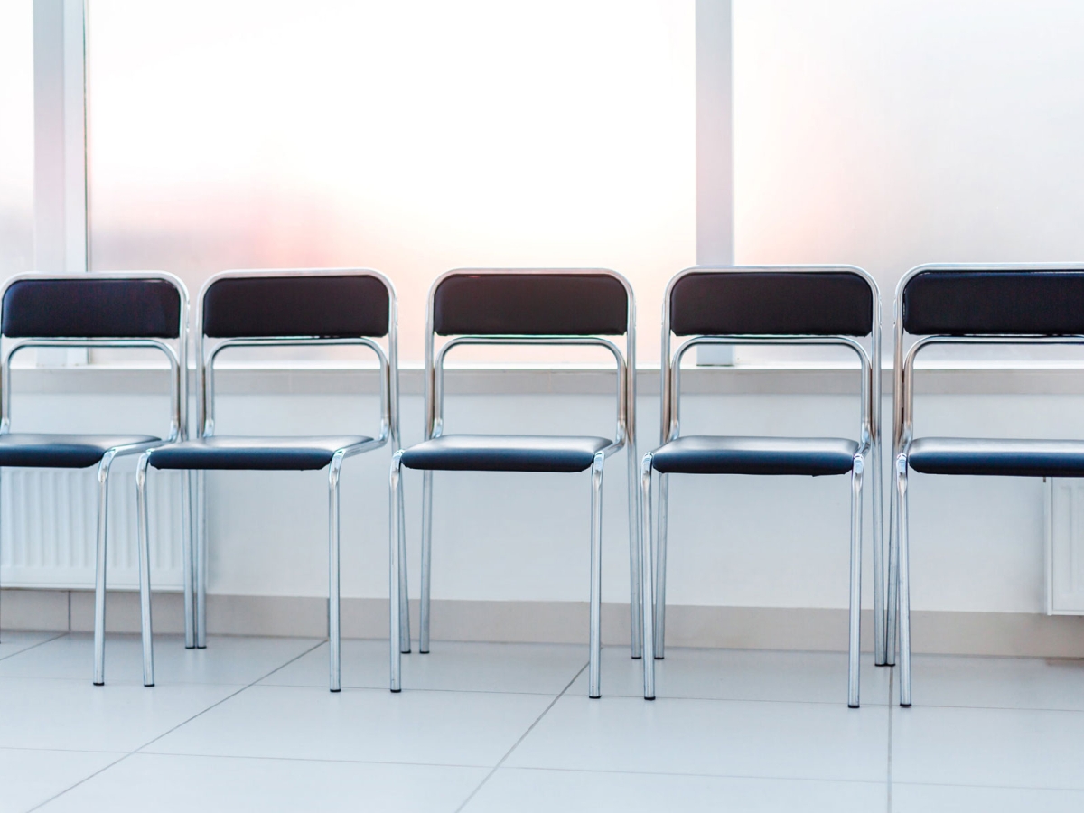 Offering employees the right to appeal a redundancy redundancy offering employees right to appeal row of empty chairs in a line