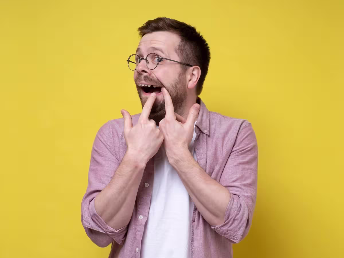 Man with broken teeth