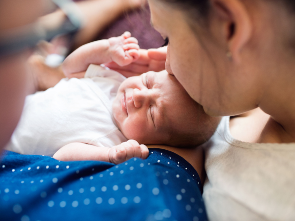 New born baby and parents breastfeeding week 2019