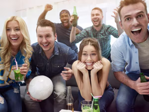 Employees watching football
