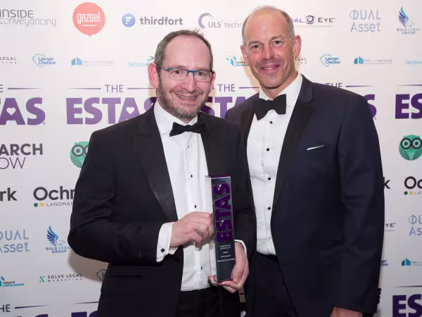 Jonathan Winston is presented with an ESTAS award by Phil Spencer