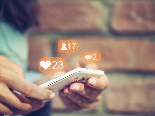 Social media and the workplace - checking phone at work