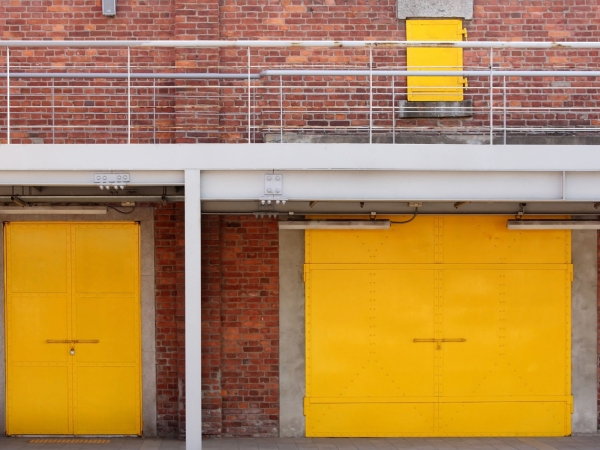yellow shutters outside a commercial building