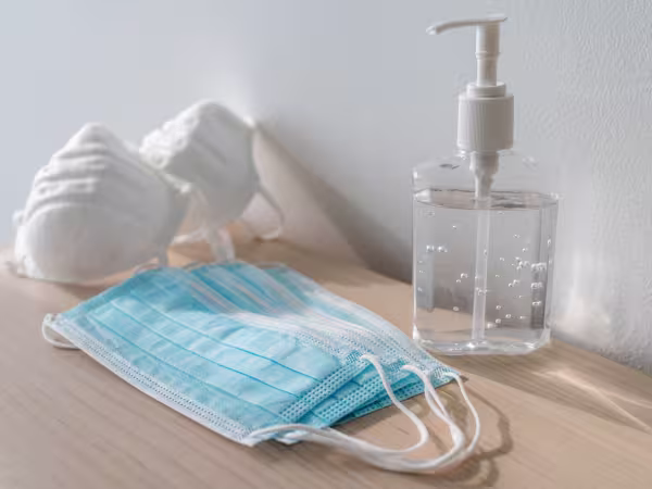 hand gel and masks return to work safety measures