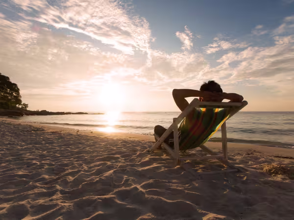 Holiday entitlement changes due to covid19 person sitting on a beach