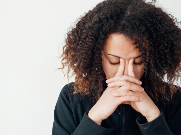 Is redundancy an asset during divorce female with head in hands