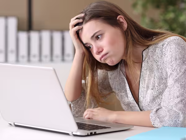 Female frustrated at dealing with furlough holiday and redundancy situation