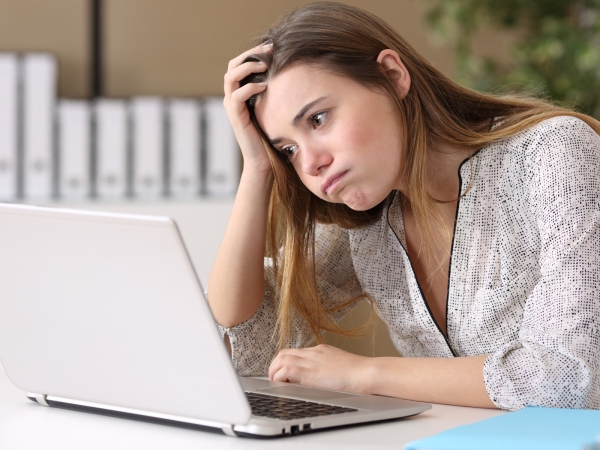 Female frustrated at dealing with furlough holiday and redundancy situation