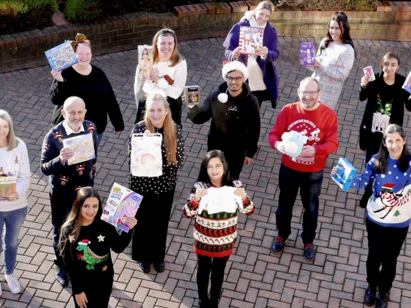 Festive Christmas jumpers ready to deliver our gifts for Cash For Kids Mission Christmas