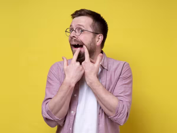 Man with broken teeth