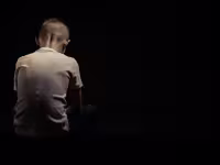 Sad boy sits alone - Dark Money BBC drama about a family affect by sexual assault on son
